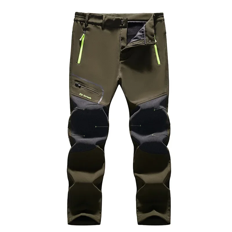 Olive green outdoor pants with neon zip pulls and padded knee area, designed for rugged hiking or motorcycling.